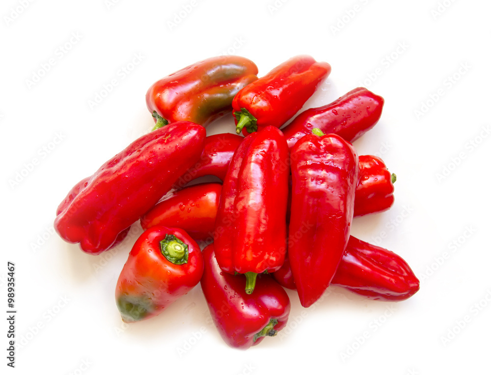 Red sweet peppers on a white background Red sweet peppers on a white background