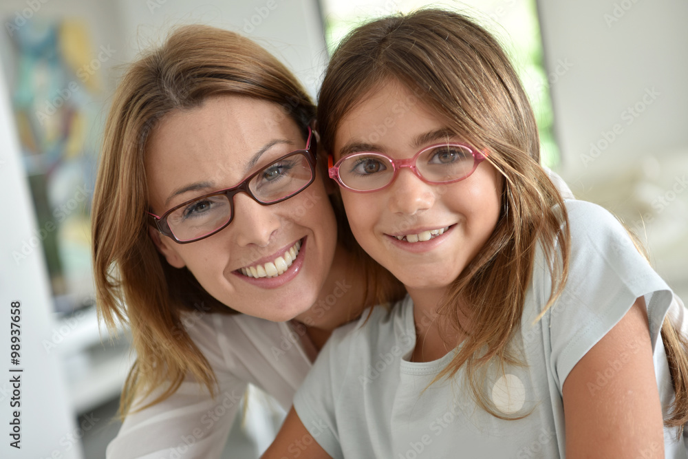 Portrait of mother and daughter with eyeglasses Portrait of mother and daughter with eyeglasses