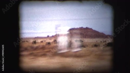 Vintage 8mm footage film through the window of a car