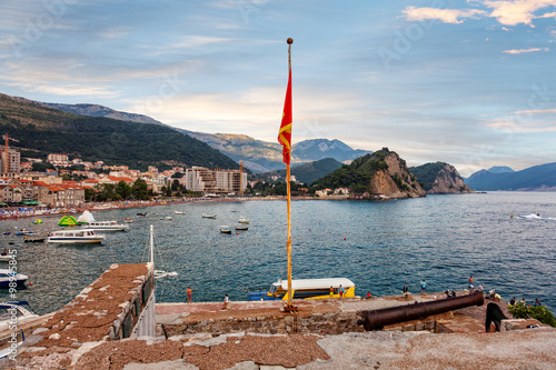 View of coastal town Petrovac, Montenegro. Adriatic resort with beach and sea. photo