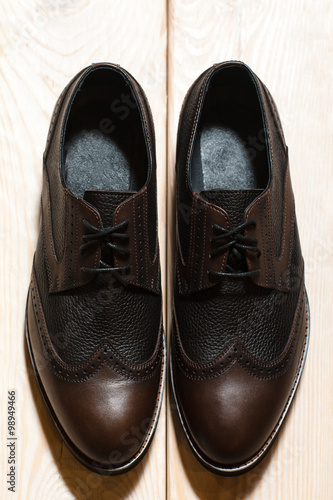 leather men's shoes. background with free space