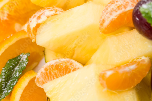 Sliced orange and pineapple.