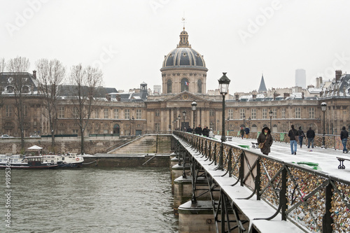 View from the Pont des Arts on the snowy Louvre Museum photo