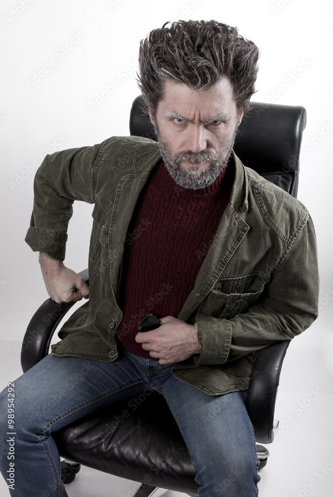 Mr. IceMan aggression, he hold the phone . fashion man in knitted sweater and jacket. Mr. IceMan aggression, he hold the phone . fashion man in knitted sweater and jacket.