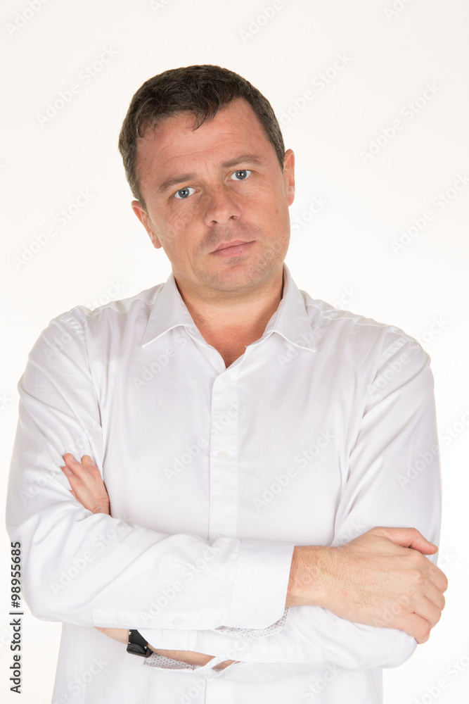 Thinking, not happy, disappointed, man with hands crossed Thinking, not happy, disappointed, man with hands crossed