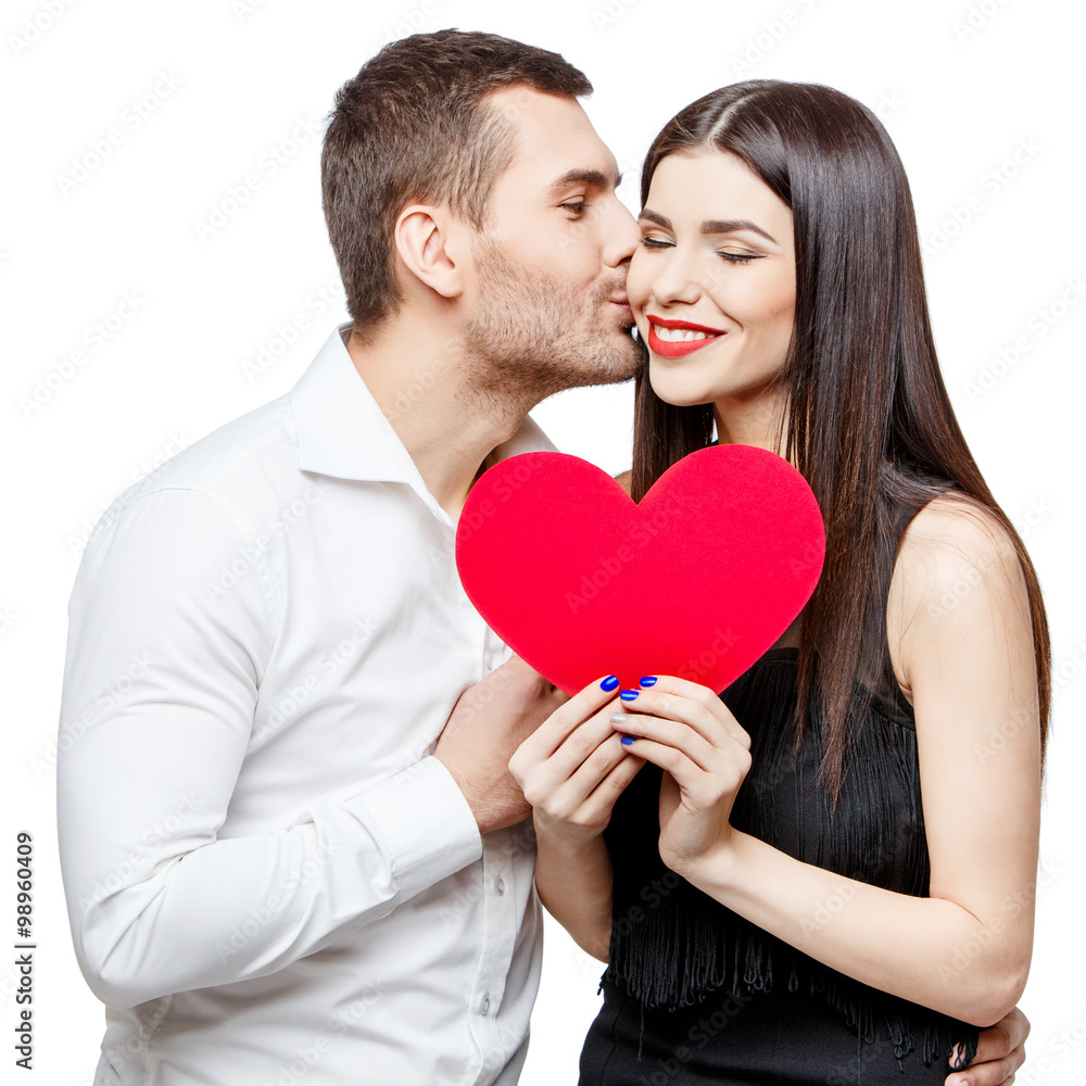 Young beautiful couple with present isolated on white