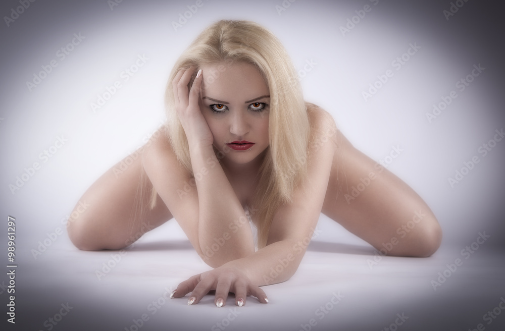 Fototapeta premium Naked blonde woman is posing 