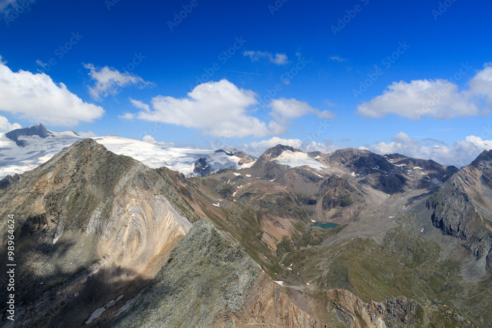 Panorama view with lake Eissee, mountain Weißspitze and glacier Großvenediger in the Hohe Tauern Alps, Austria