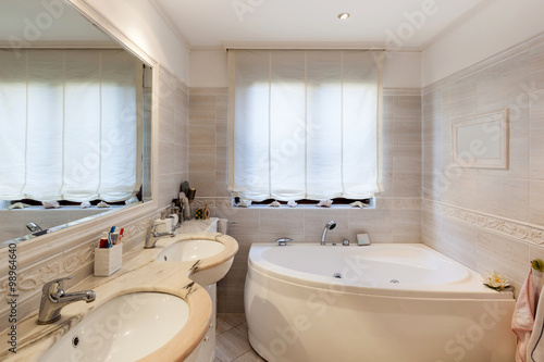 Bathroom of a modern apartment  marble cladding