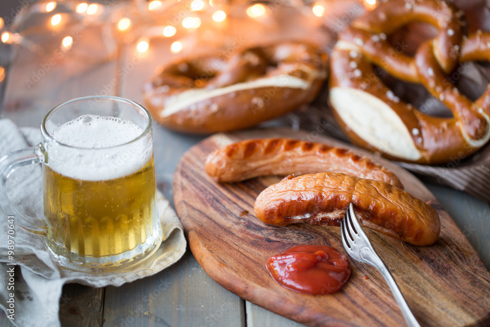 bavarian sausages with bretzel and beer bavarian sausages with bretzel and beer