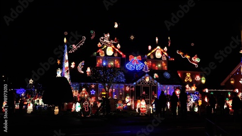 House Decorated With Colorful Christmas Lights For Christmas Holidays