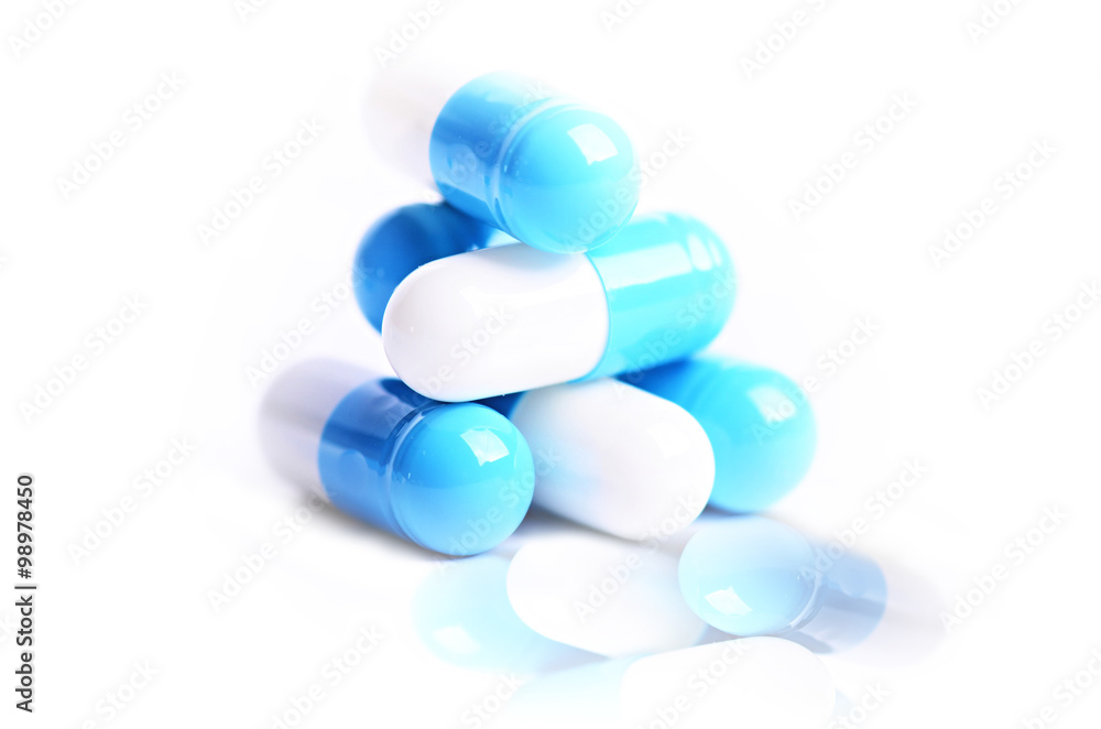 Tablets. Pills on a white background. Isolated. Building from pills. Pharmacy. Medical background. Medicine. Capsule. Close up Tablets. Pills on a white background. Isolated. Building from pills. Pharmacy. Medical background. Medicine. Capsule. Close up