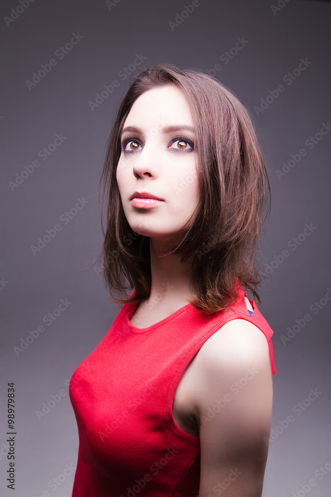 Fototapeta premium Elegant woman looking up with perfect makeup