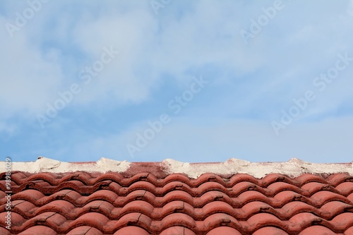 red tile and blue sky