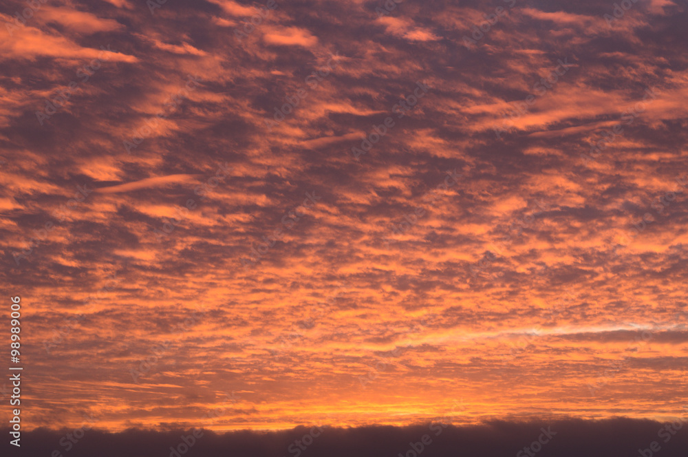 Fiery sunset sky background
