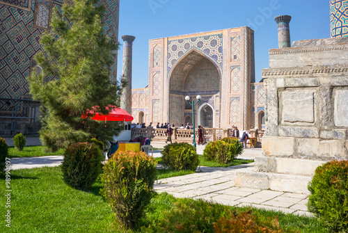 Uzbekistan, Samarkand, the garden leading to the Registan square with the wanderful mosque and madrassah