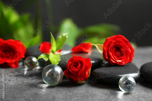 Photography Beautiful spa composition with roses and stones