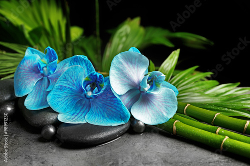 Fototapeta Naklejka Na Ścianę i Meble -  Beautiful spa composition with blue orchid, bamboo and stones