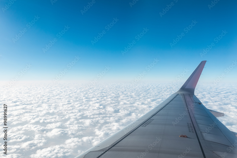 aircraft wing above the clouds aircraft wing above the clouds