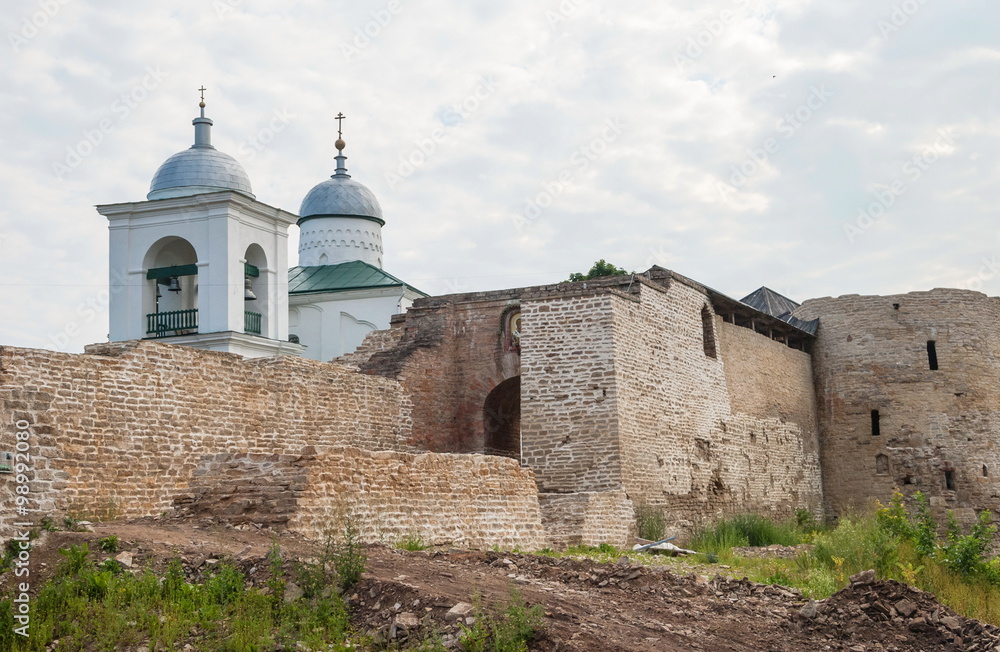 Church and walls of ancient fortress Izborsk in Russian