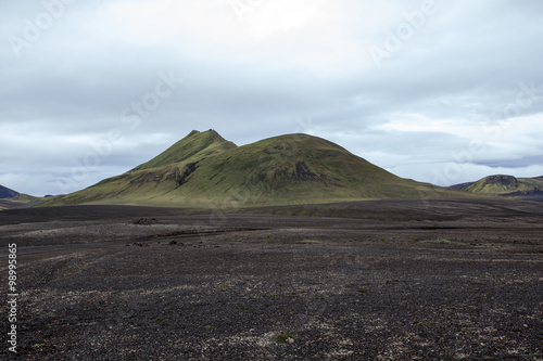 Paesaggio in Islanda, montagna verde nella nebbia photo