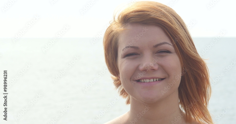 Close up portrait of beautiful young redhead woman Close up portrait of beautiful young redhead woman