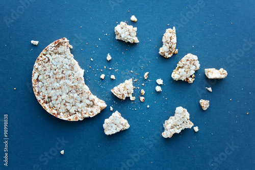Round wheat bread and crumbs