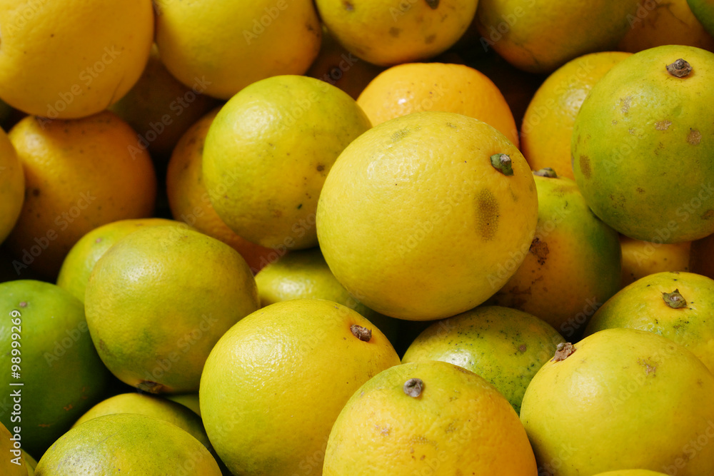 The group of fresh Chinese green oranges.