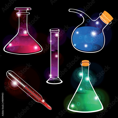 Set of laboratory flasks on a black background. Cartoon