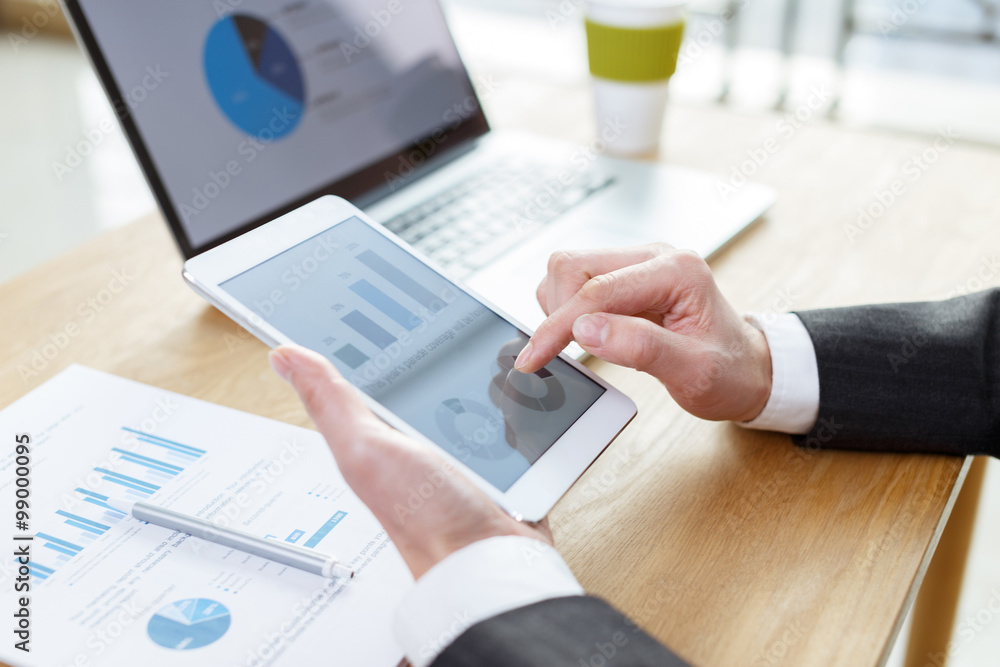 businessman checking financial reports on table businessman checking financial reports on table