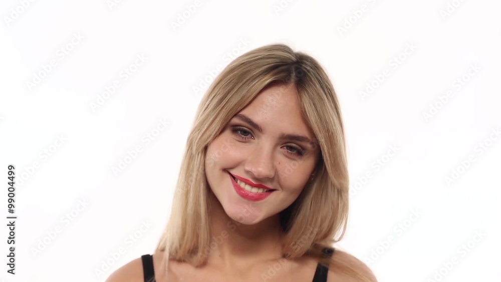 Beauty woman eating fresh and juicy apple at white background Beauty woman eating fresh and juicy apple at white background