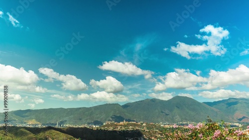 Time lapse sequence of tropical clouds moving along a capital city. Caracas, Venezuela. 4k-3840 x 2160. photo