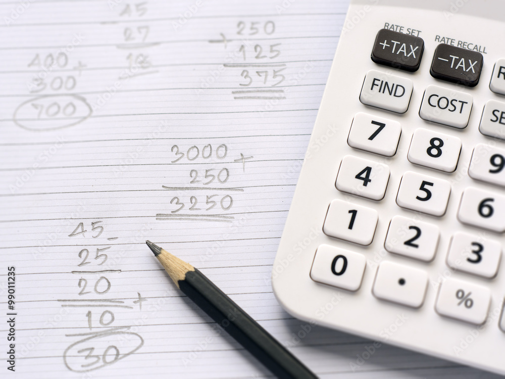 Calculator and pencil on note paper with calculation concept select focus  Stock Photo | Adobe Stock