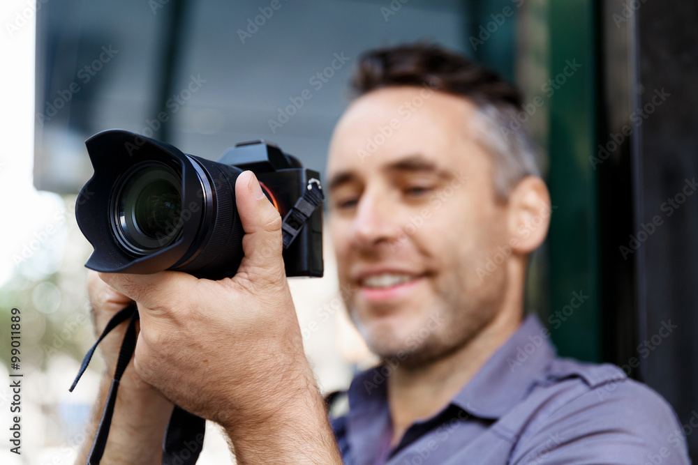Male photographer taking picture Male photographer taking picture