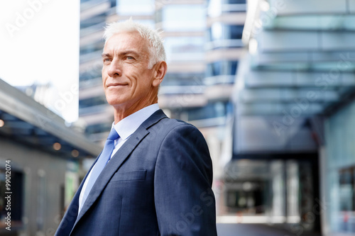 Portrait of confident businessman outdoors