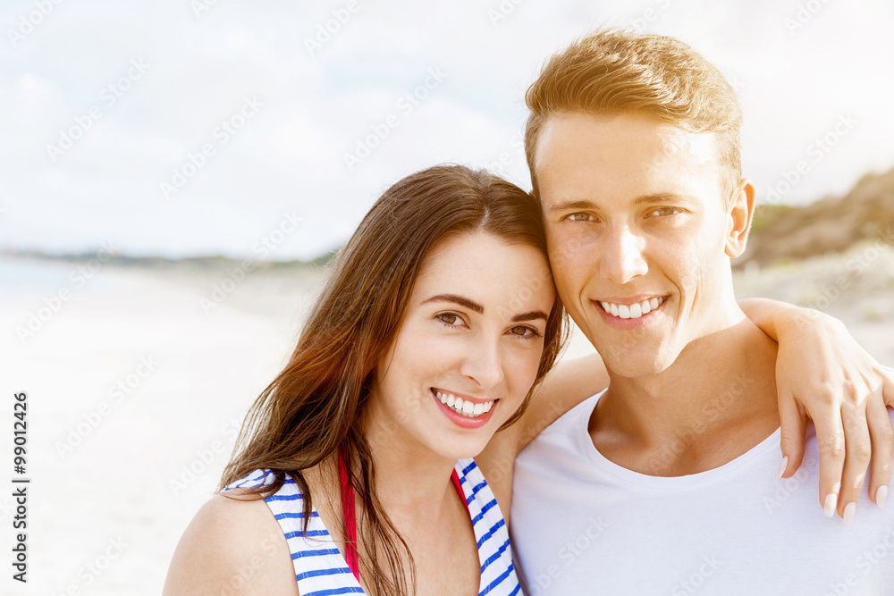 Romantic young couple on the beach Romantic young couple on the beach