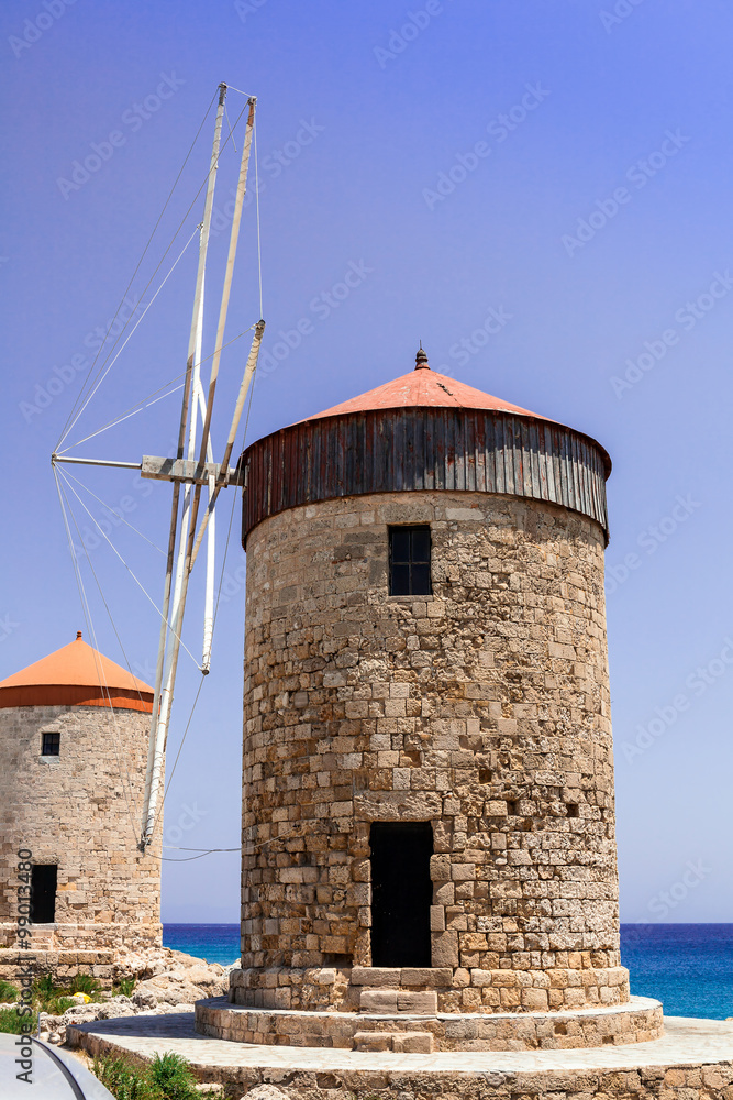 Medieval windmills at the Mandraki harbor in Rhodes. Medieval windmills at the Mandraki harbor in Rhodes.