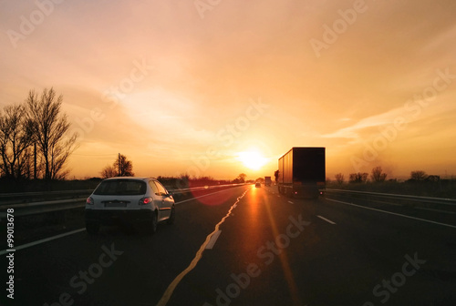 Fototapeta Naklejka Na Ścianę i Meble -  Driving road motorway sunlight freedom holidays