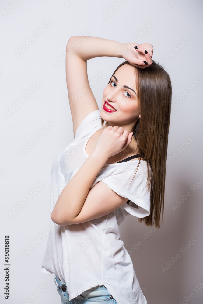 Sexy young girl in denim shorts shirt studio Sexy young girl in denim shorts shirt studio