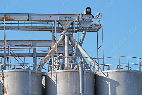 industrial silo with blue sky background