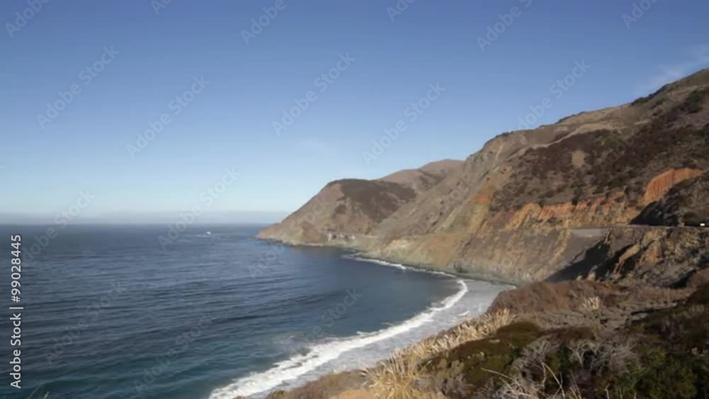 View of the Pacific coastline, looking along Pacfiic Coast Highway One towards a bridge, California, USA. View of the Pacific coastline, looking along Pacfiic Coast Highway One towards a bridge, California, USA.