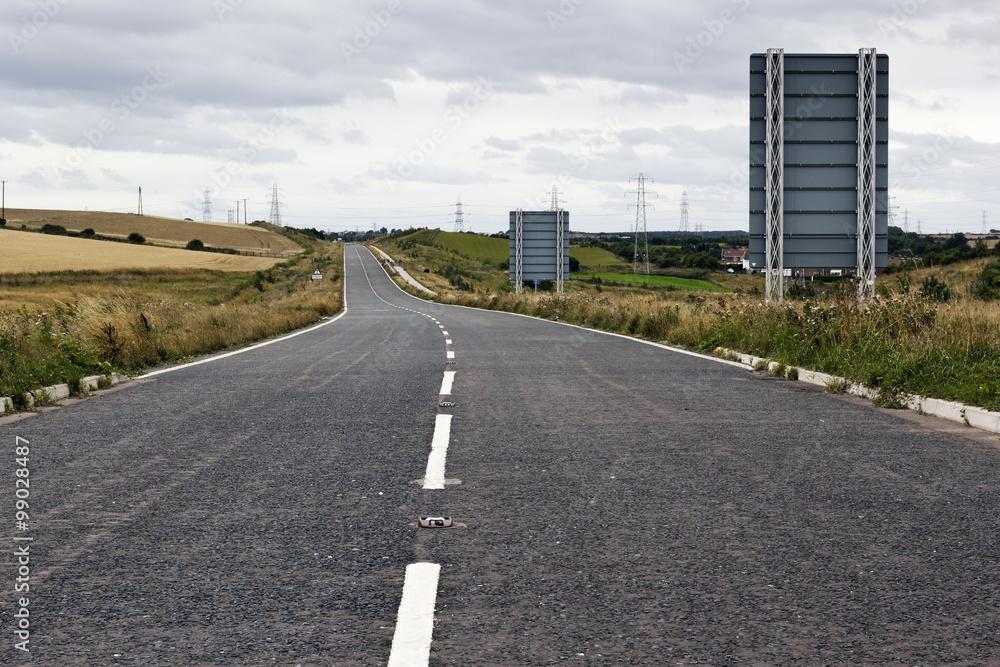 Empty rosd or highway stretching into the distance Empty rosd or highway stretching into the distance