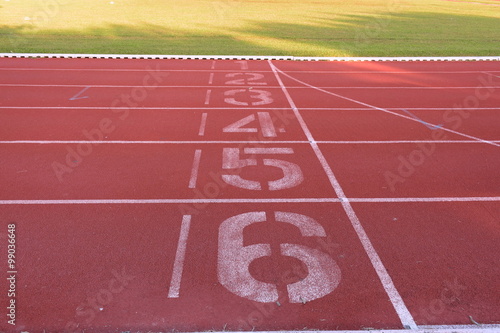 Running track and sports field.
