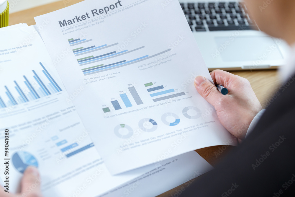 businessman checking financial reports businessman checking financial reports