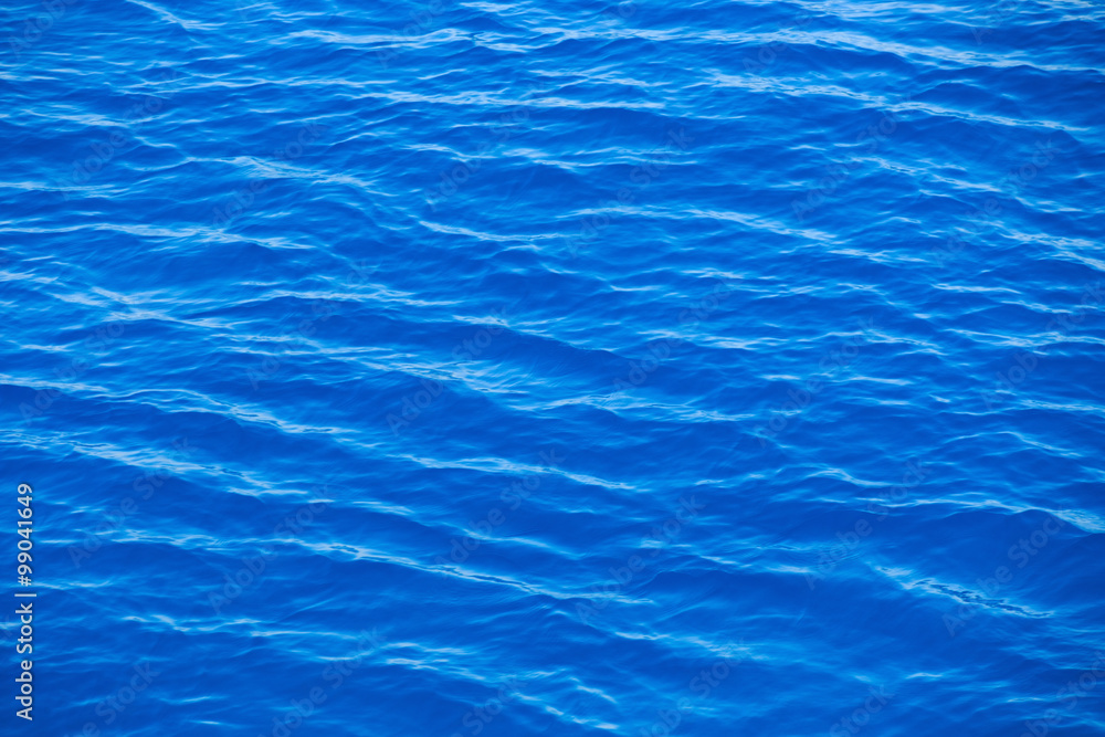 Obraz premium Blue sea surface with waves