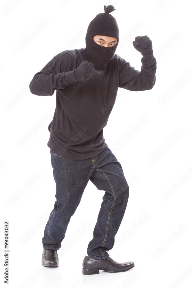Burglar wearing mask on over white background Burglar wearing mask on over white background