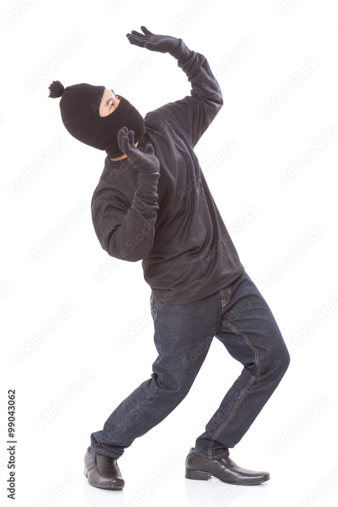 Burglar wearing mask on over white background Burglar wearing mask on over white background