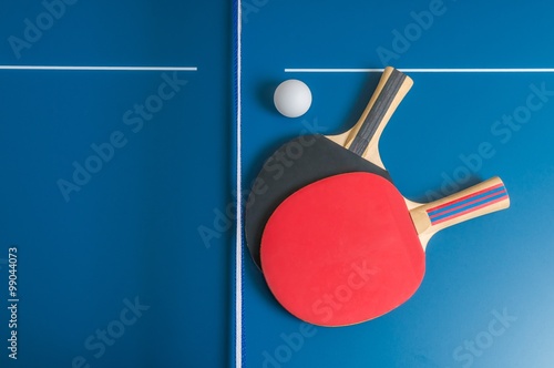 Obraz na płótnie Table, net and rackets for playing ping pong