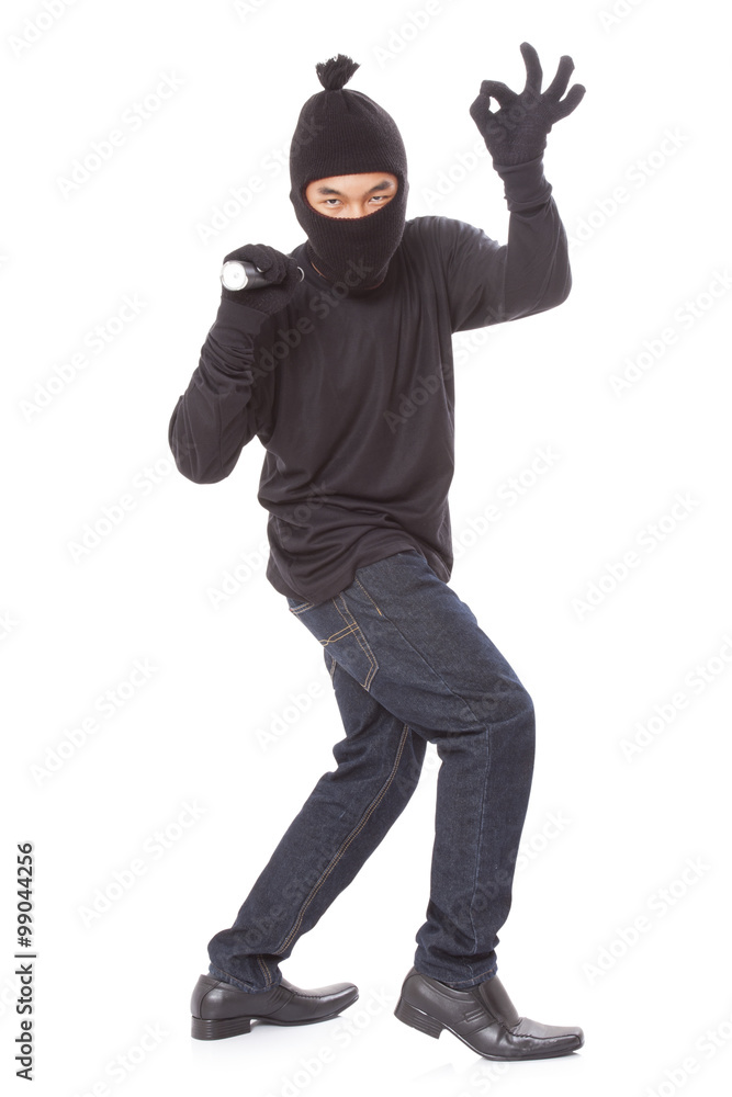 Thief holding flashlight with showing ok sign on white background Thief holding flashlight with showing ok sign on white background