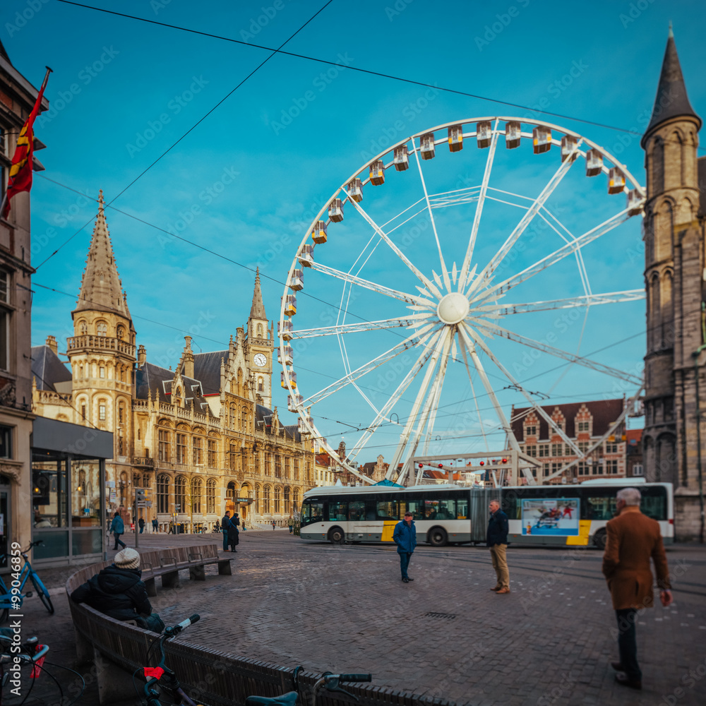 View over the huge, traditional Christmas wheel in Ghent, Belgium, with a film warm colors emulation and high resolution, large panorama for huge prints